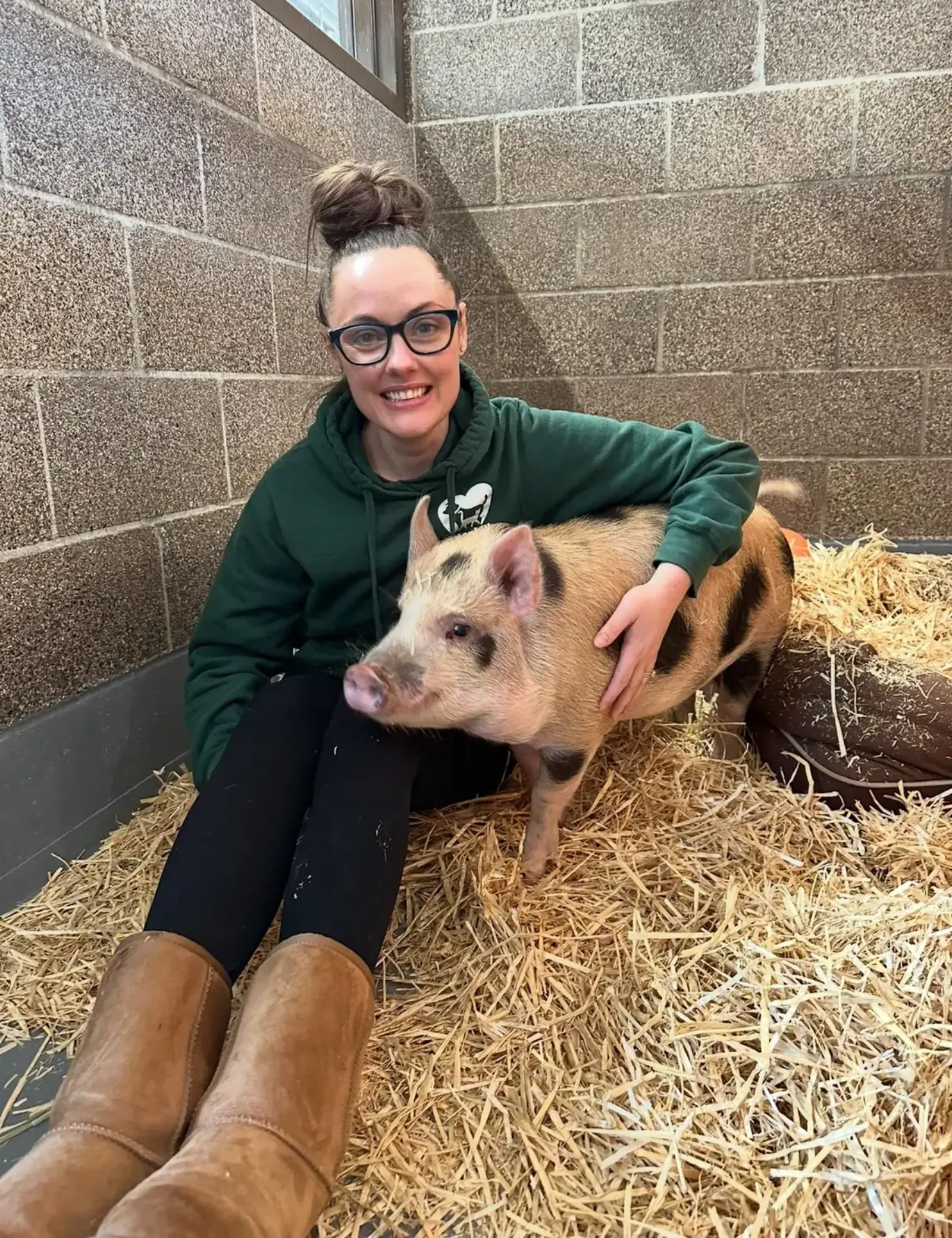 Sarah with a pig at Greenhill Humane Society